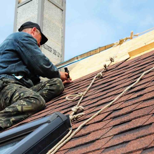 professional-roofer-at-work